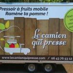 camion qui presse